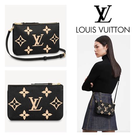 louis vuitton double zip bag.